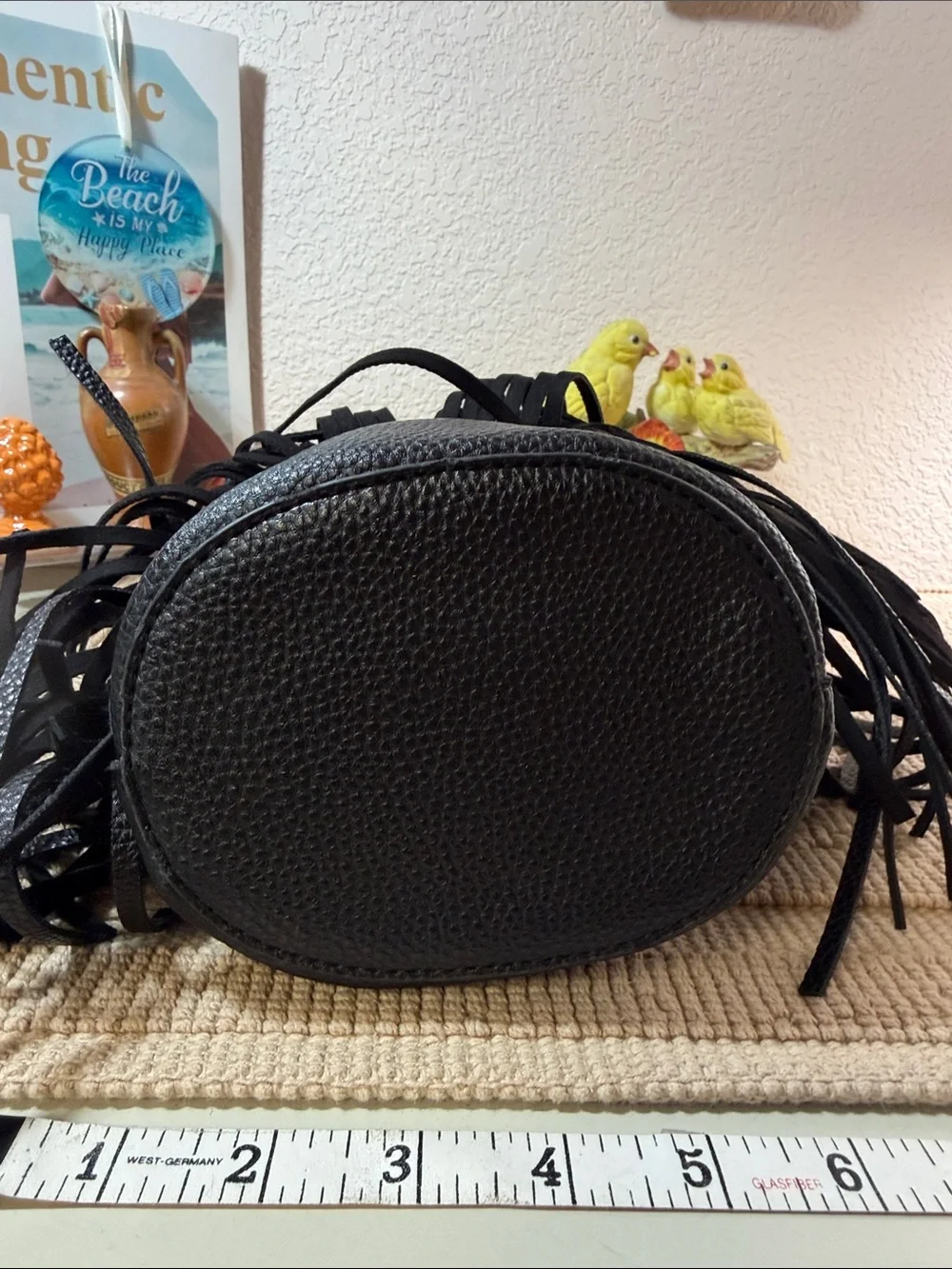Black Fringed Wristlet with Amber Acrylic Ring Handle